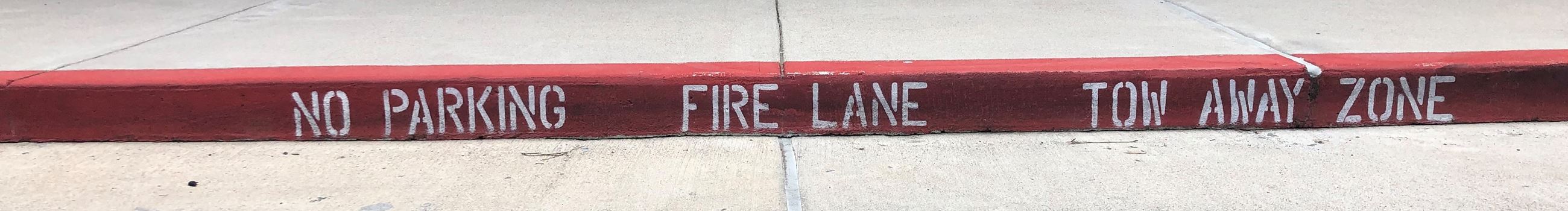 NO PARKING FIRE LANE TOW AWAY ZONE Curb Marking (JPG)